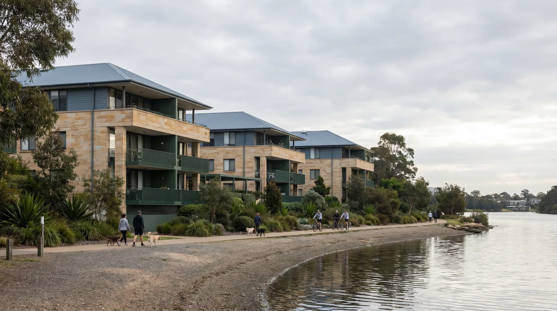 Low-rise waterfront apartment buildings along the foreshore at Huntleys Cove