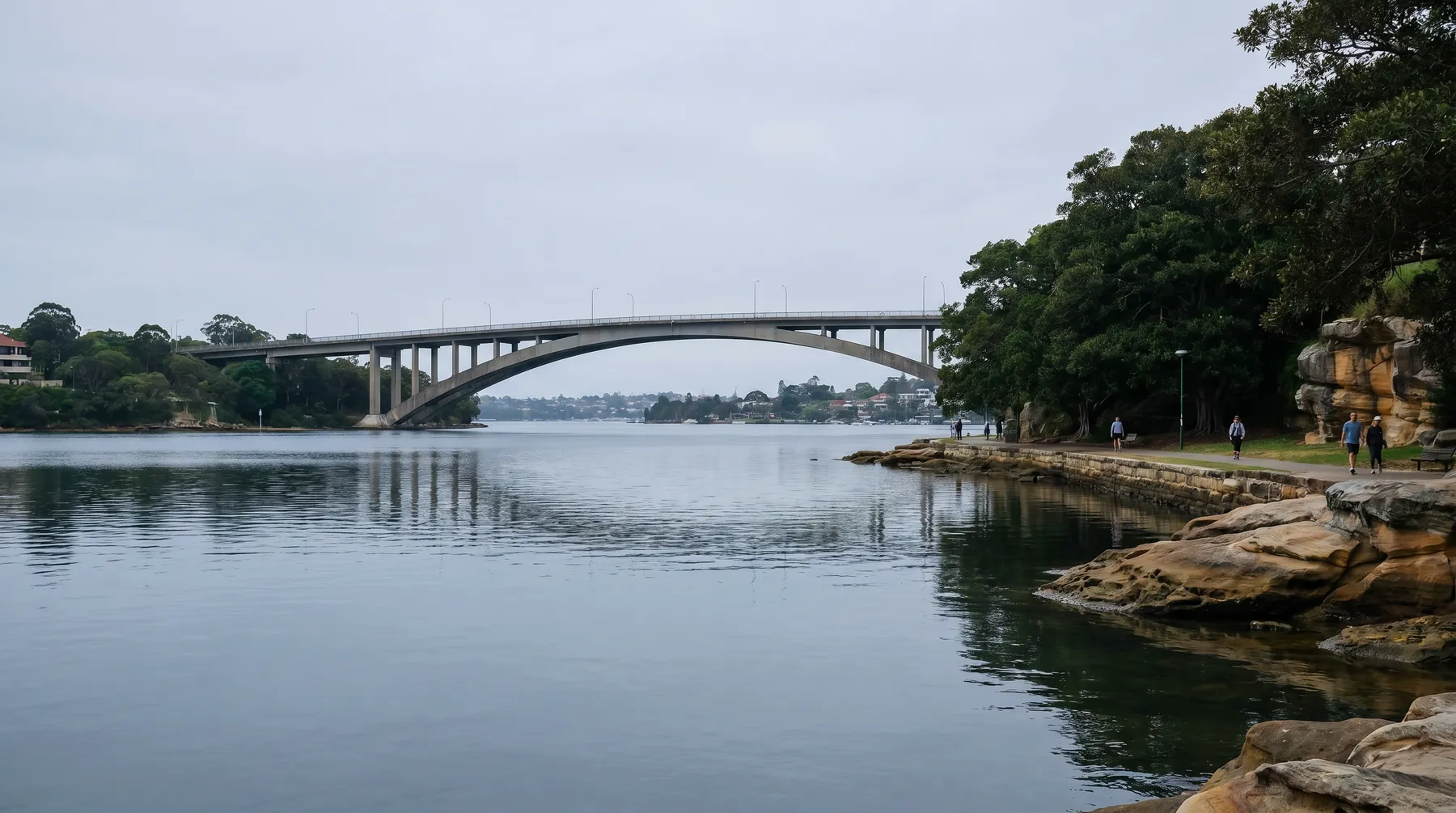 The long concrete arch of Gladesville Bridge over the Parramatta River